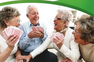 Picture of members of the ABC Charity enjoying a game of cards together